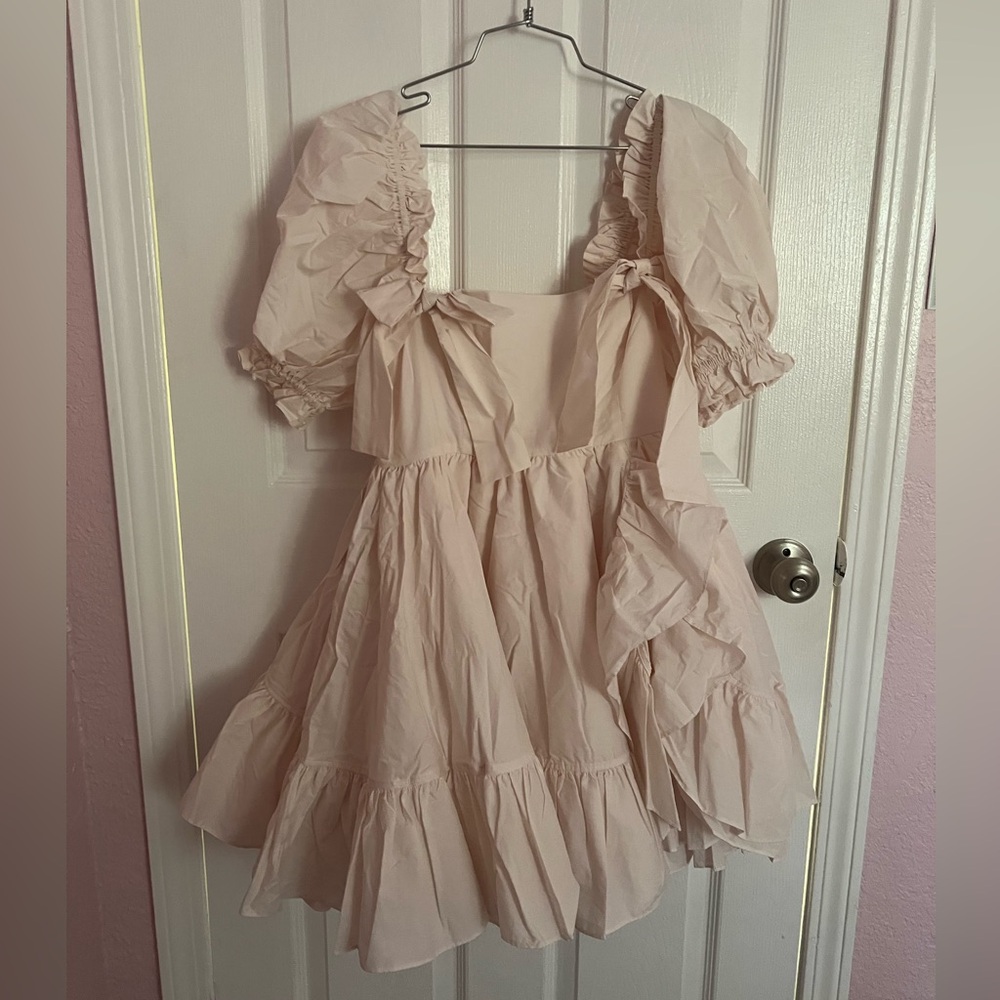 Brand new, NWT, never worn before. 
It doesn’t fit me unfortunately!